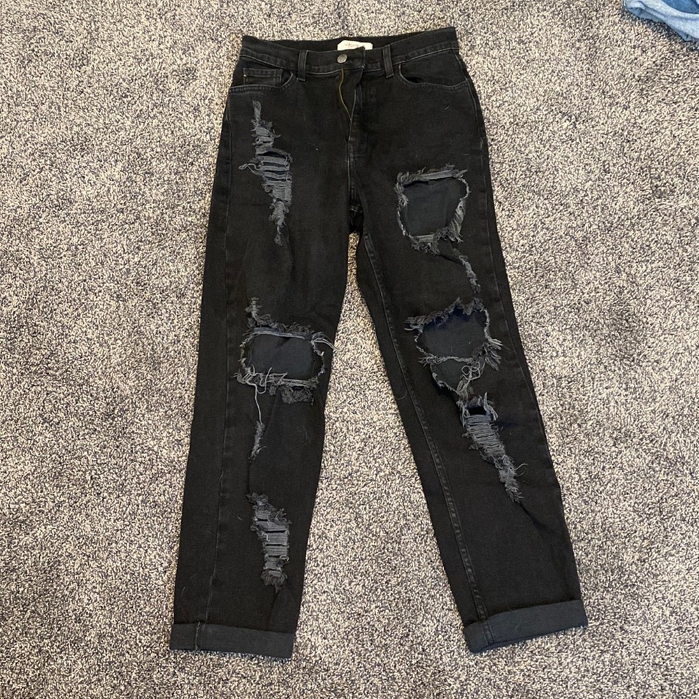 Vibrant black ripped jeans